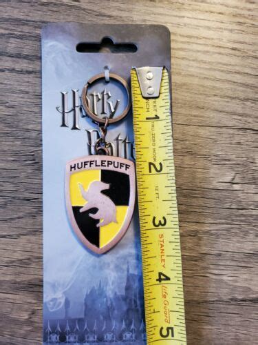 harry potter house metal keychain hufflepuff by bioworld|Amazon.com: Hufflepuff Keychain.